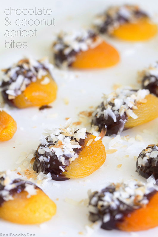 Chocolate and coconut covered apricot bites arranged on a plate for an easy no-bake treat