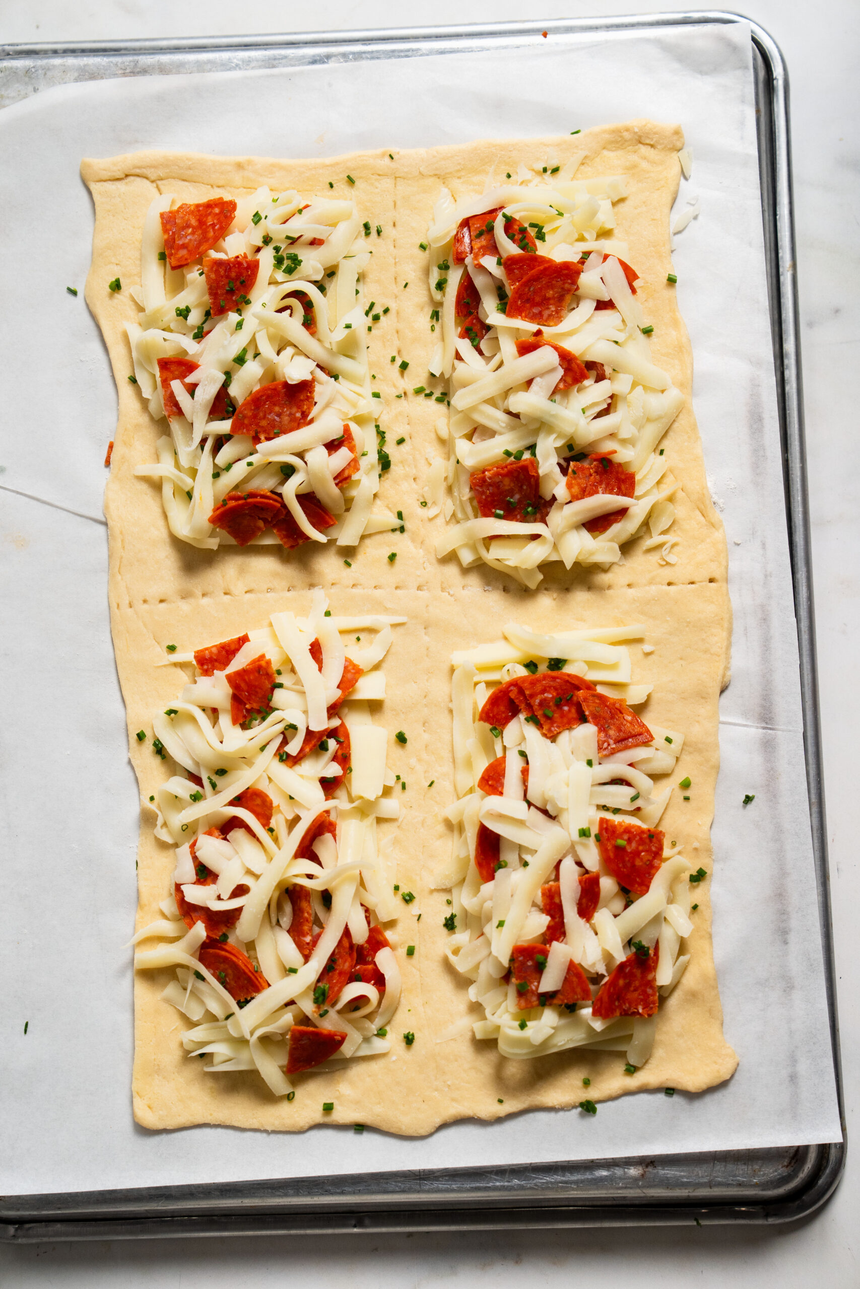 Air Fryer Pizza Pocket step by step instructions of filling on dough.