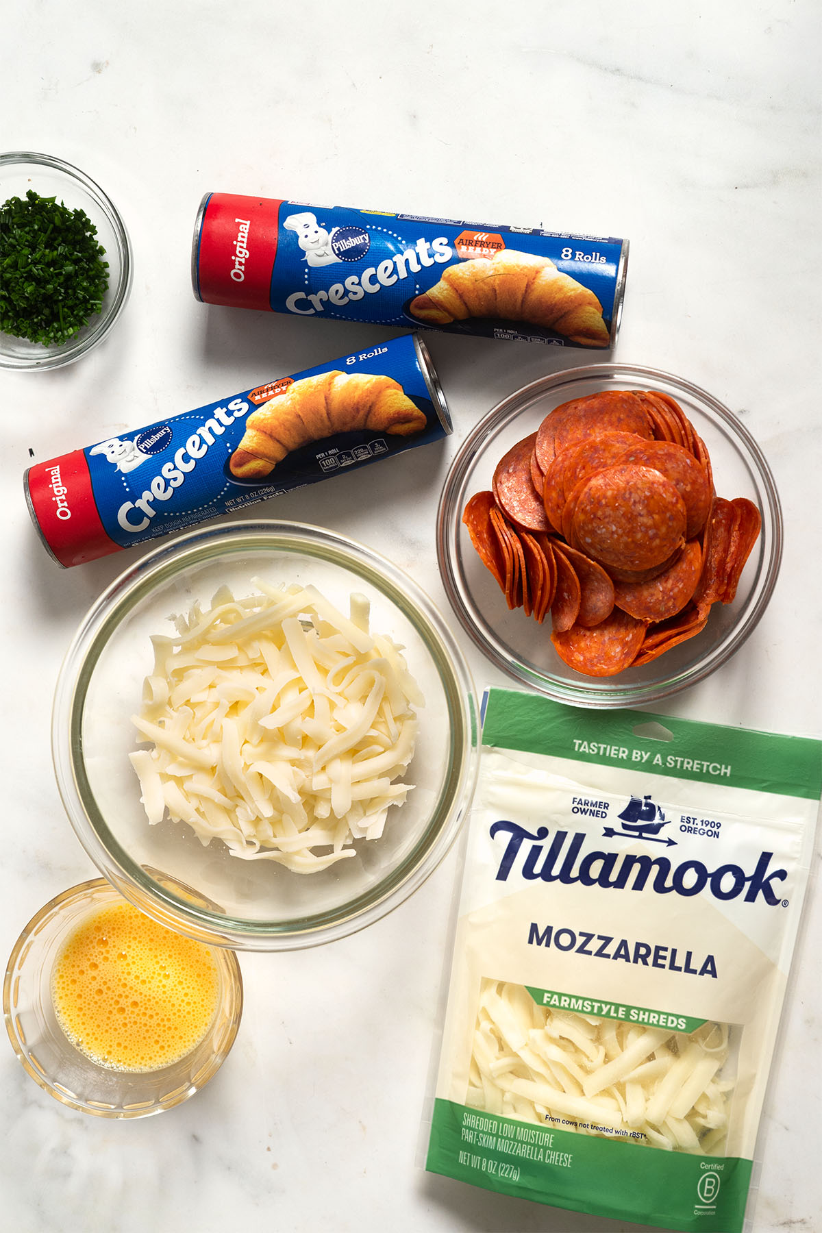Air fryer Pizza Pocket ingredients on a white board.