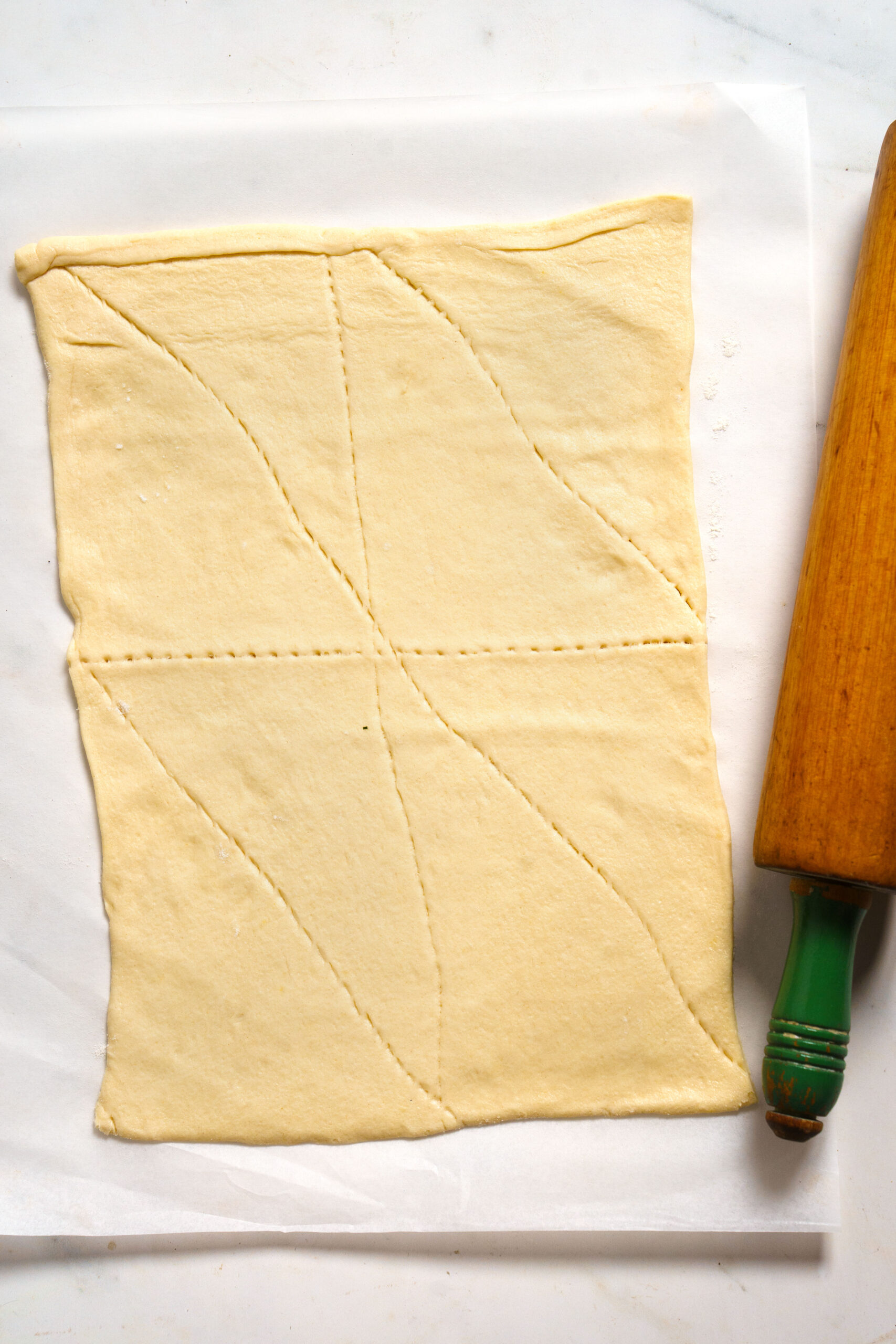 Air Fryer Pizza Pocket step by step instructions of dough being rolled out