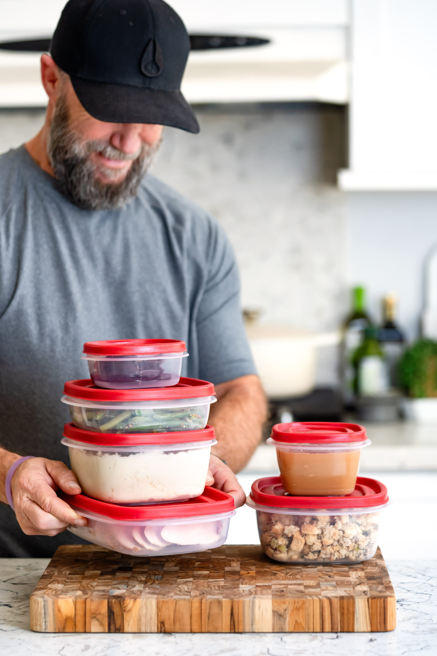 Overhead shot of kids assembling sliders with various Thanksgiving leftovers.